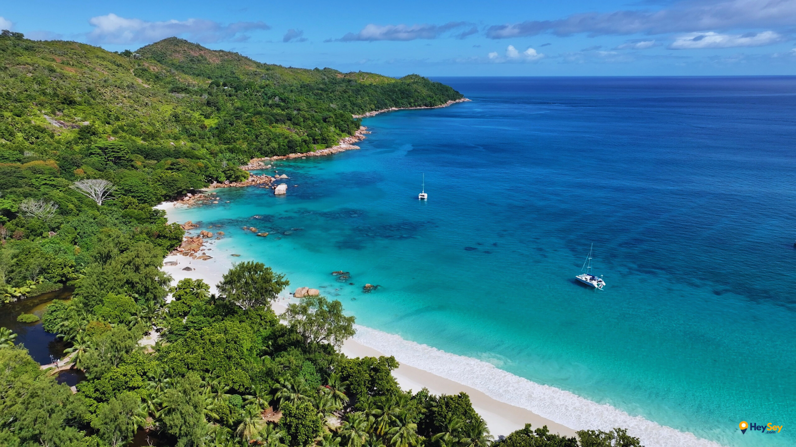 Anse Lazio Beach Praslin Seychelles aerial view with turquoise water white sand and granite rocks